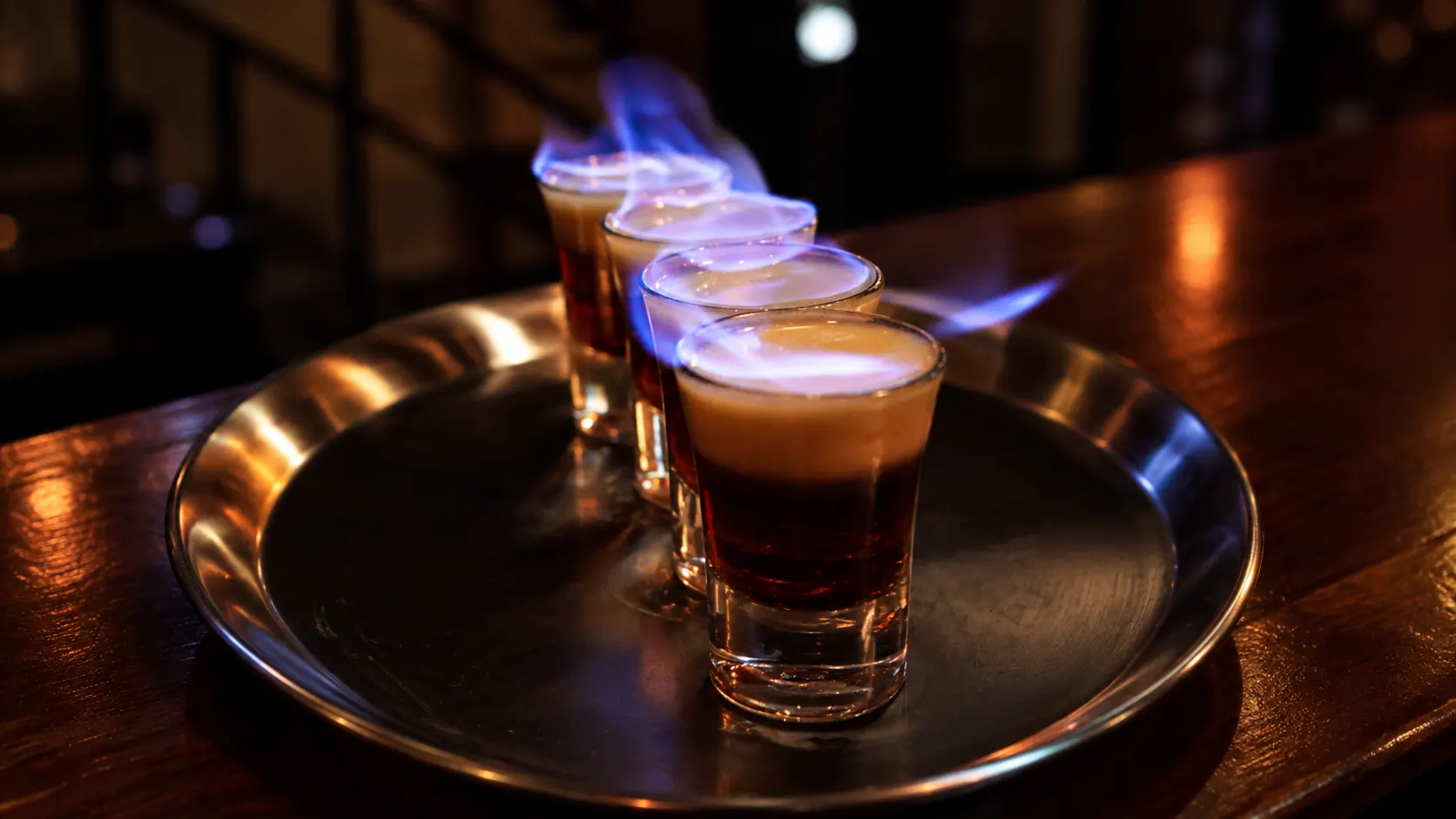 Layered B52 shots, burning with a blue flame.